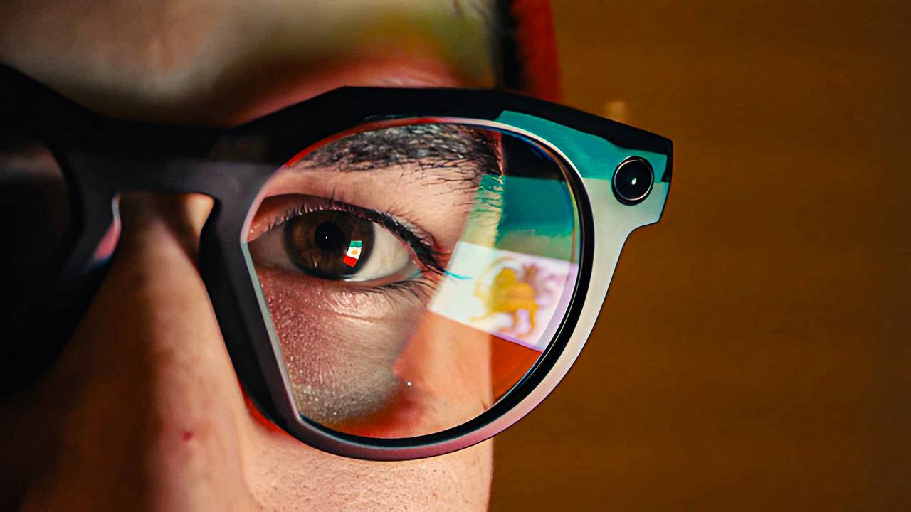 Eye reflection through glasses, tinted with the Iranian flag