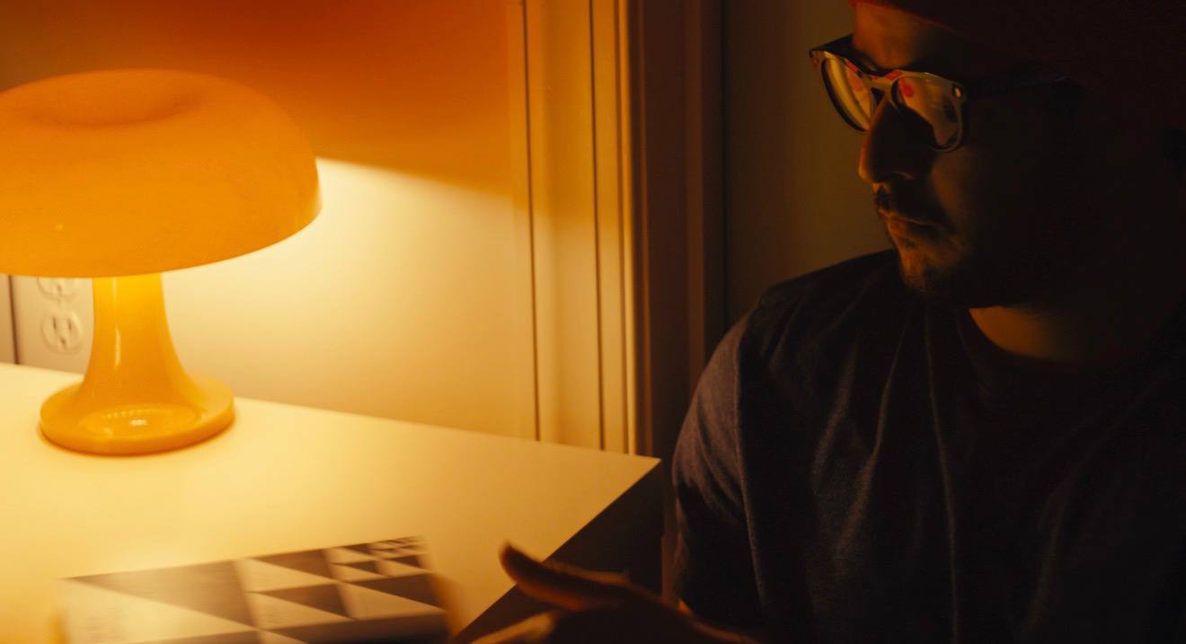 Warm lamp glow in a dim room